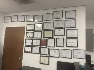 Whole World Massage Wall of Plaques, Awards, Certificates, Credentials